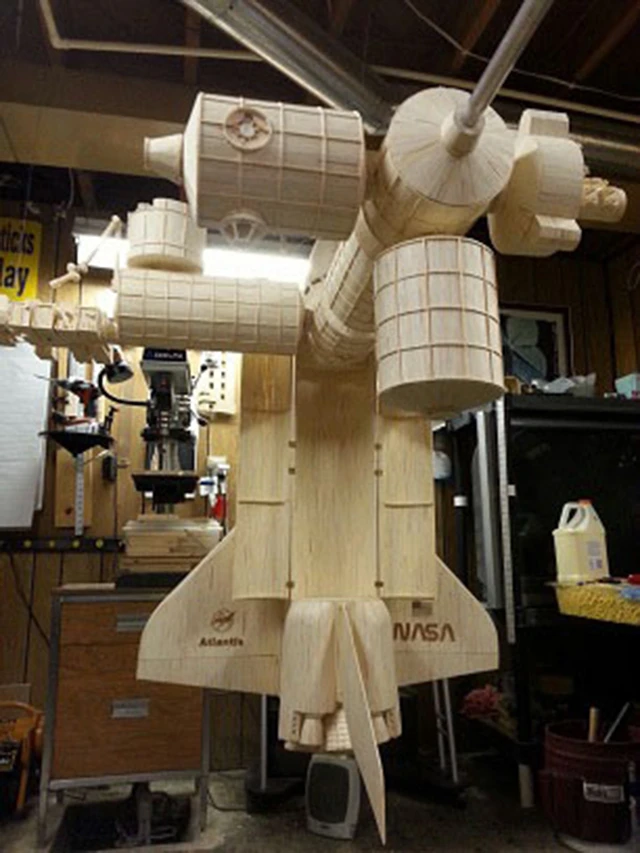 Acton also built a scaled down version of the Space Shuttle Atlantis to go with the ISS
