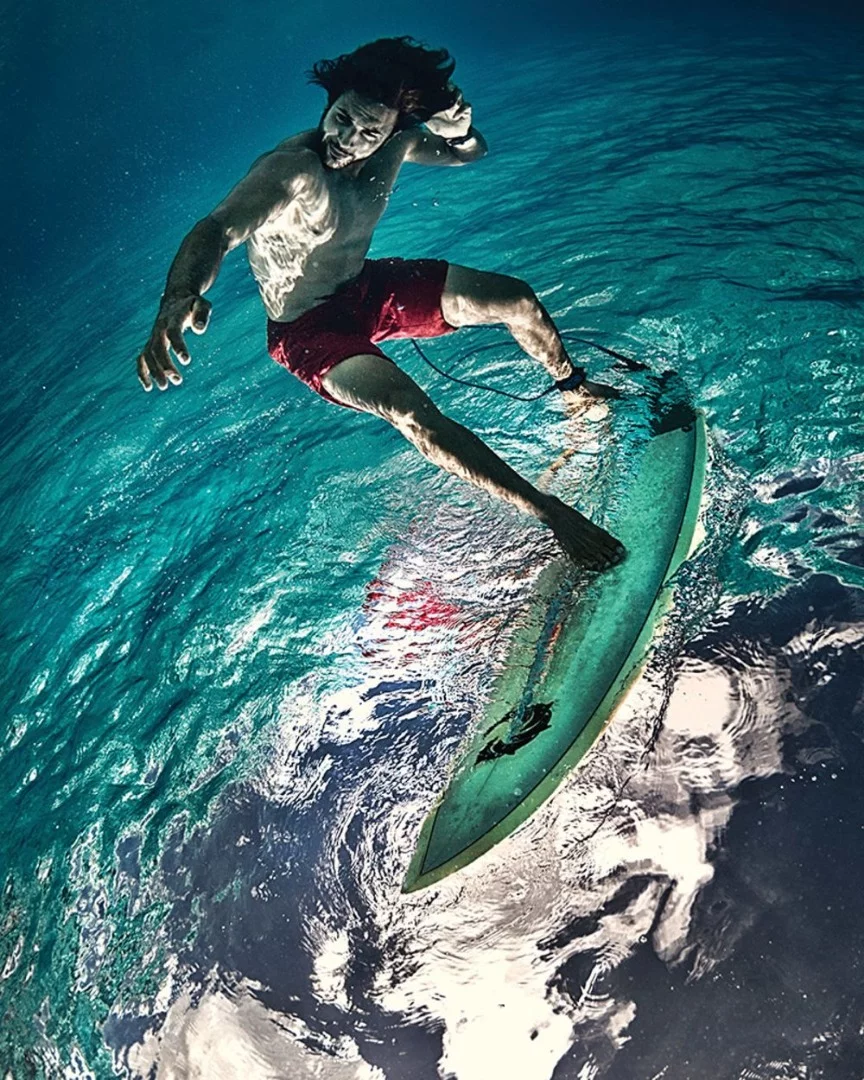Honorable mention. It took Lorenzo Mittiga three hours and 100 tries to get this image of an underwater surfer right
