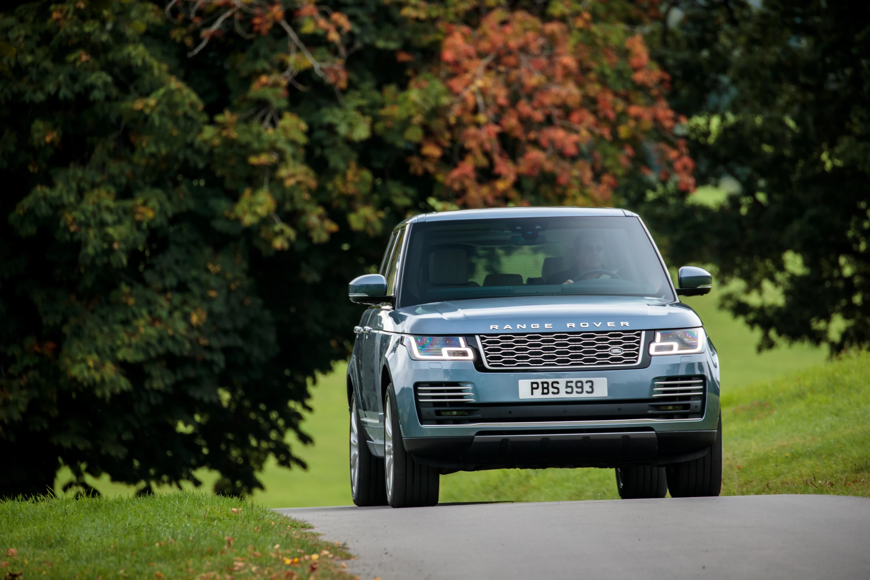 The recharge socket on the Range Rover P400e is hidden behind a Land Rover badge on the front grille