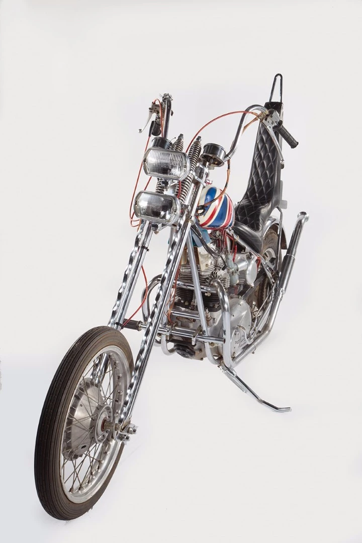 This is the custom Triumph “Sunset Tripper” chopper ridden in the epic documentary film The Song Remains the Same. Led Zeppelin commissioned Ron Hagest, owner of California-based Burbank Customs, to create Triumph-based choppers for each of the band members and this bike was built for drummer John Bonham, inspired by the “Captain America” chopper from Easy Rider.