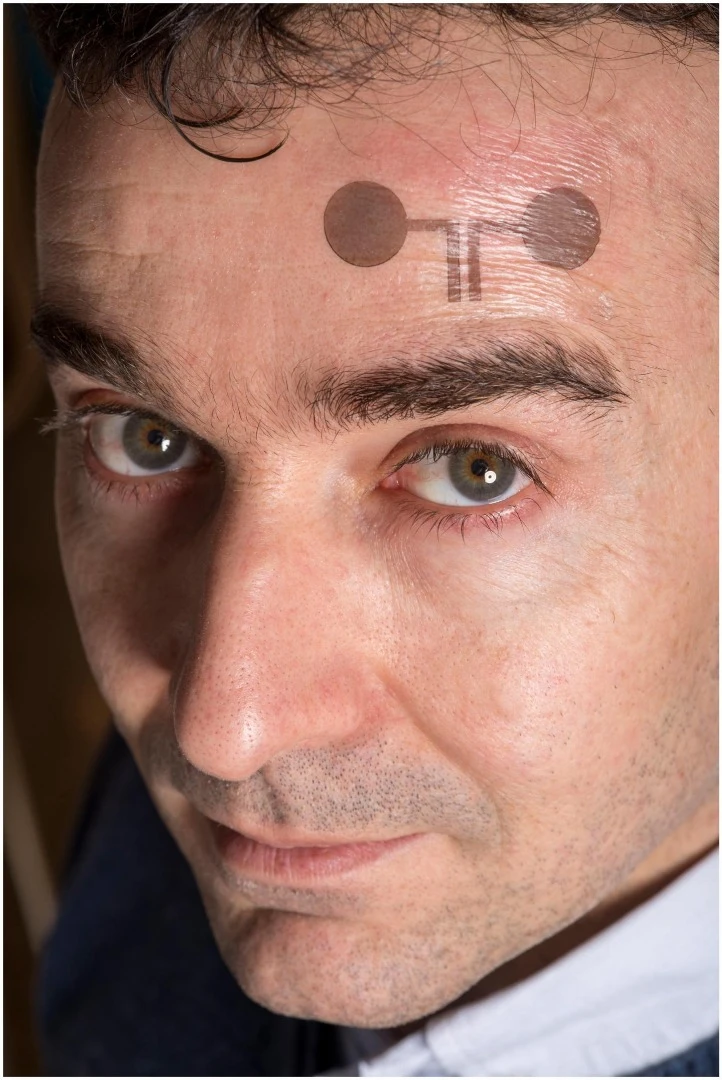 Lead scientist Francesco Greco sports one of the tattoo electrodes
