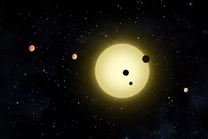 Artist's impression of Kepler-11 planetary system as three planets transit - observed by NASA's Kepler spacecraft on Aug 26 2010 (Credit: NASA - Tim Pyle)