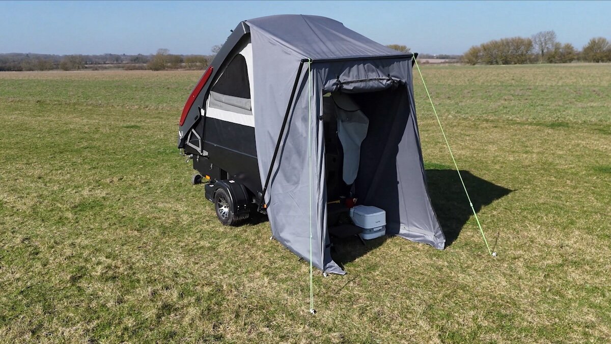 Tiny clamshell camper cranks into madly efficient micro habitat