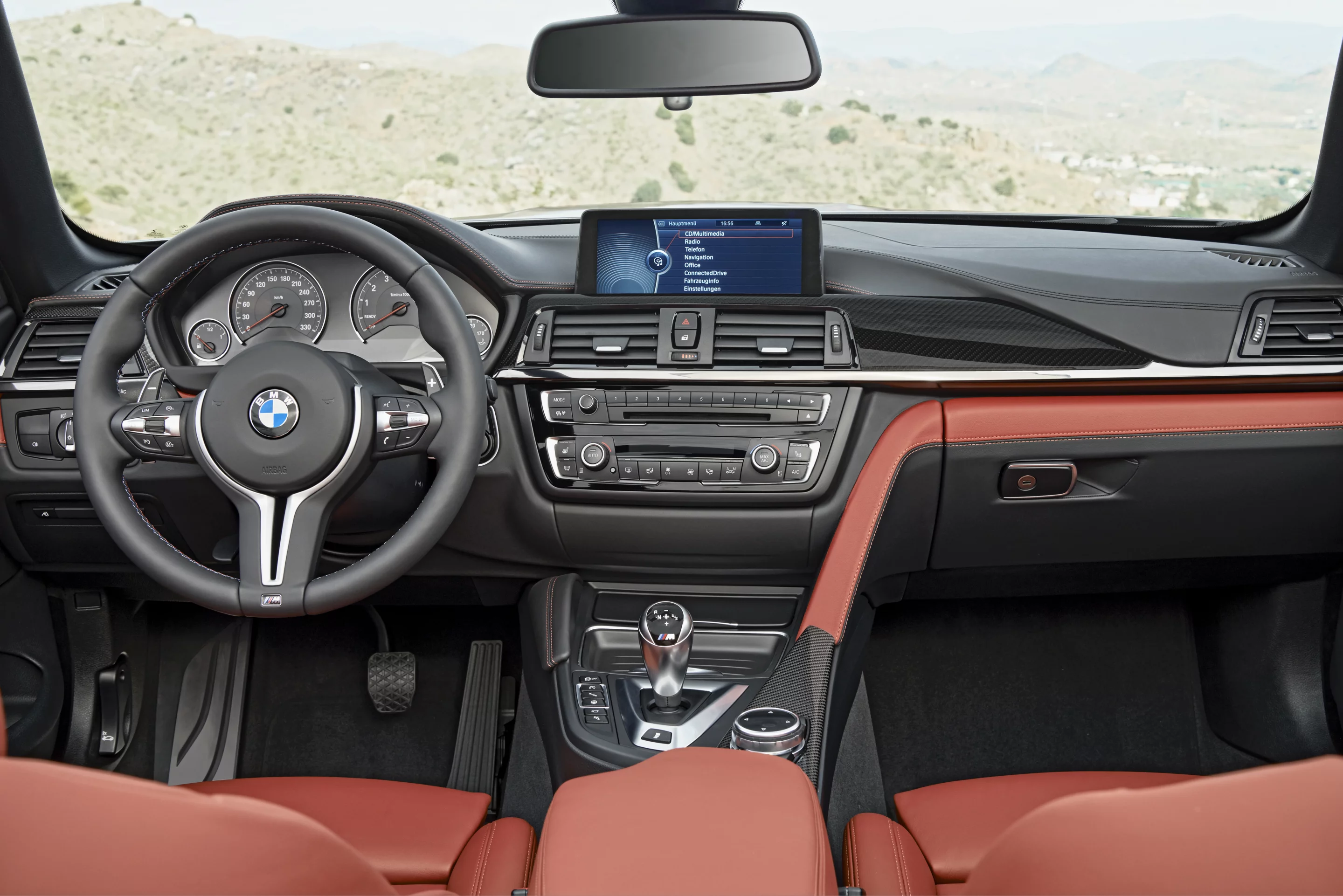 Interior details and amenities of the convertible are similar to the hard-topped M4