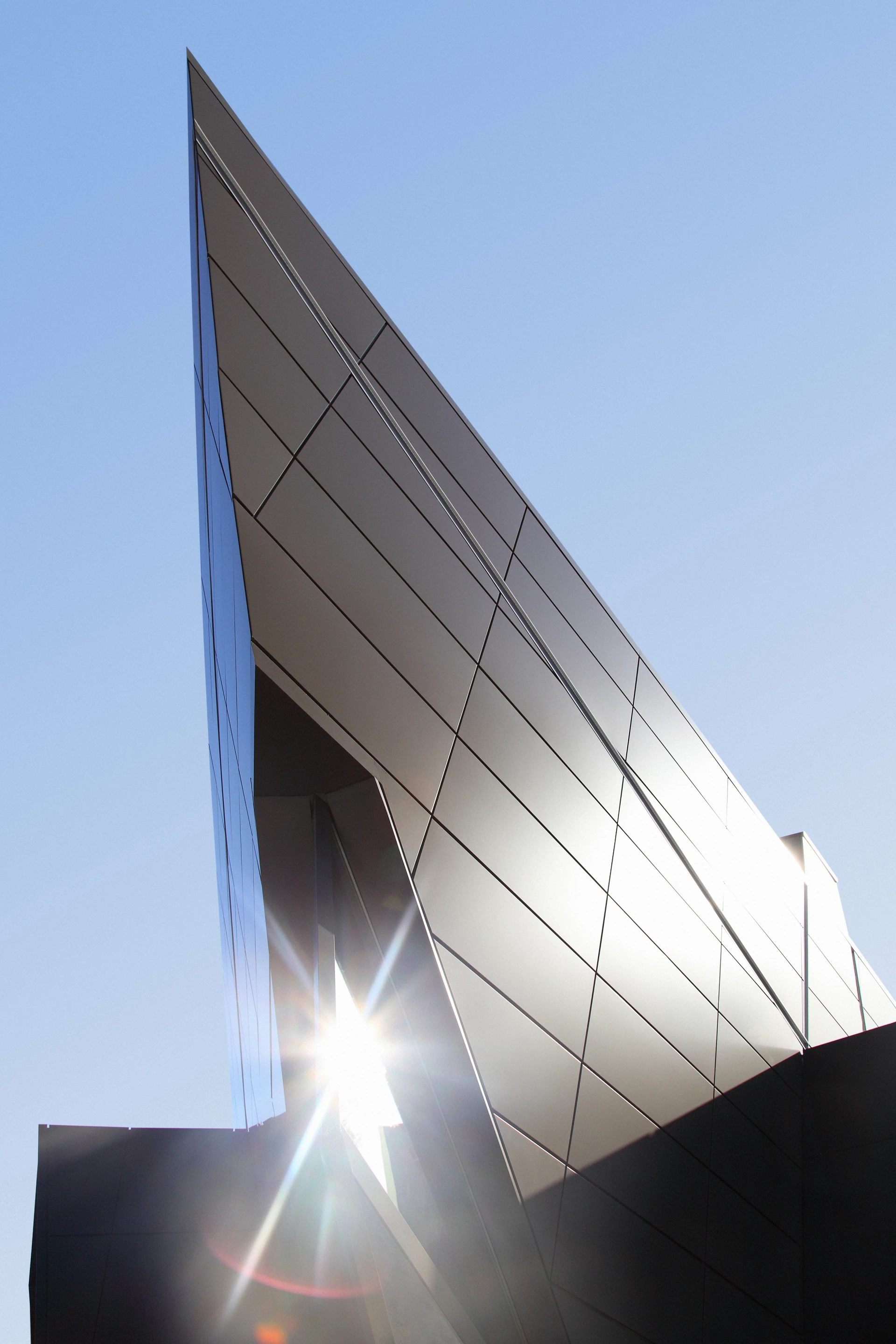 The museum's structure was built using reinforced concrete walls and features an aluminum bonded facade