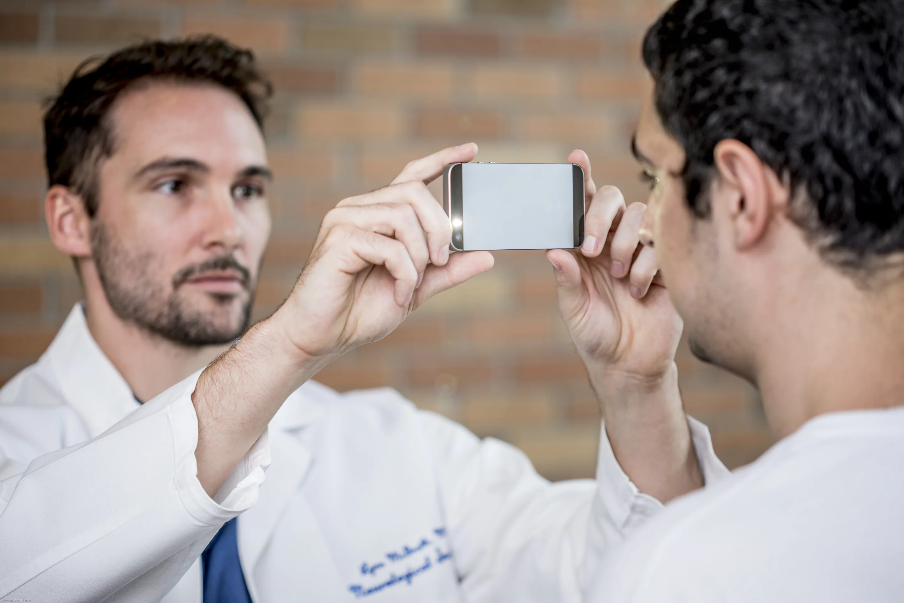 An app called PupilScreen uses the phone's flash to stimulate the eye and the camera than captures a three-second video, looking for signs of concussion