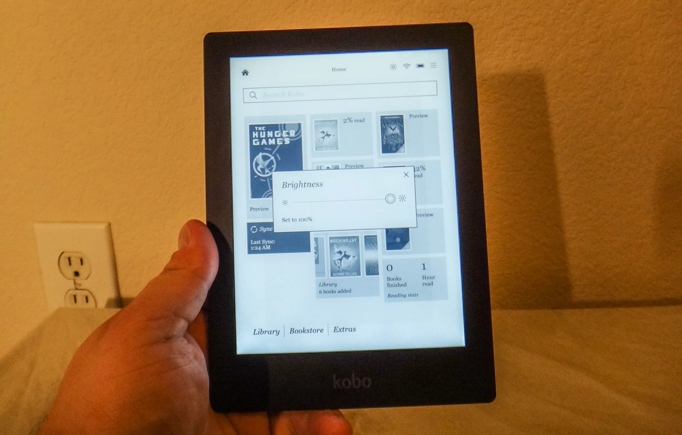 A small button on top of the e-reader activates the backlight, which definitely comes in handy for low-light situations