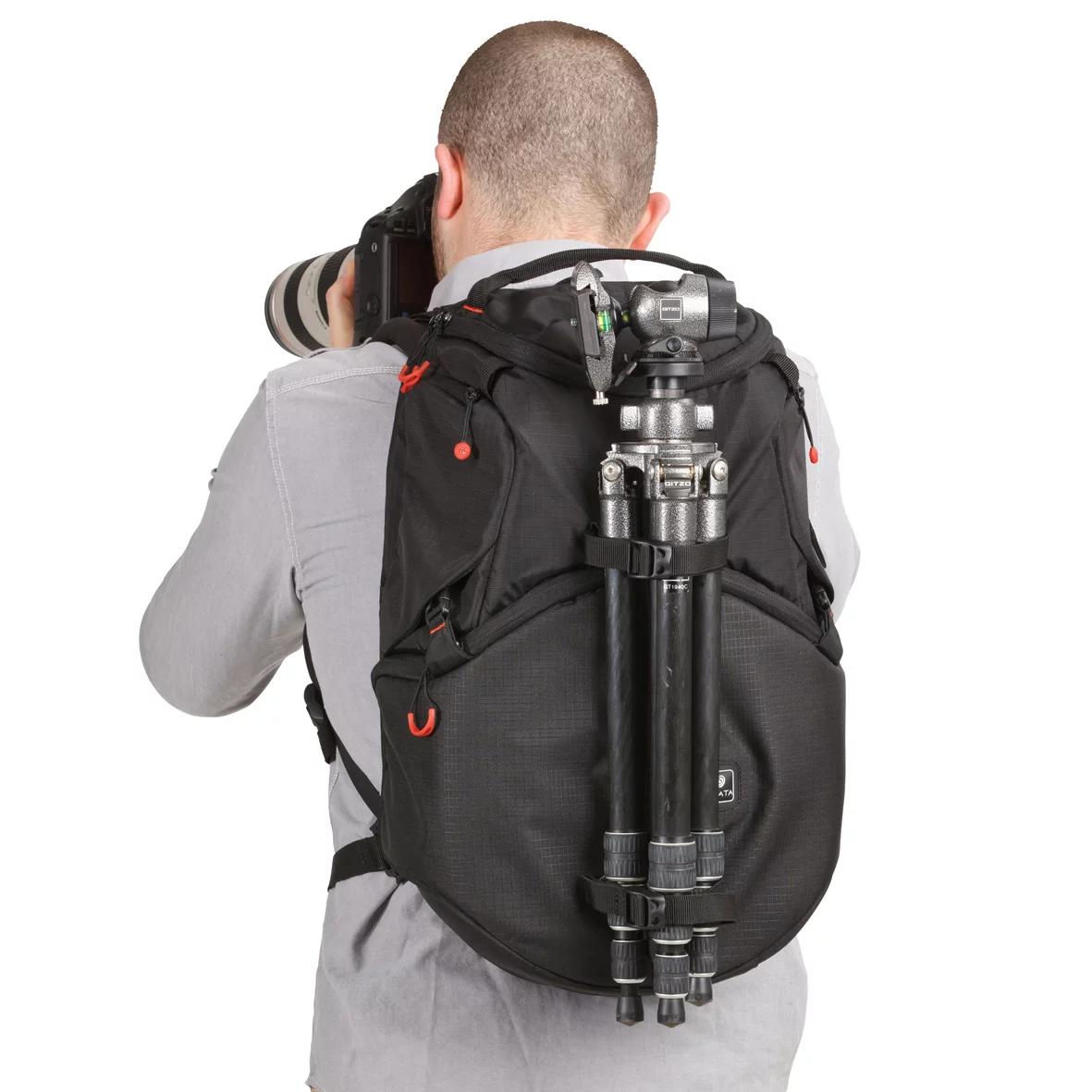 The Revolver-8 backpack also has straps for carrying a tripod on the front