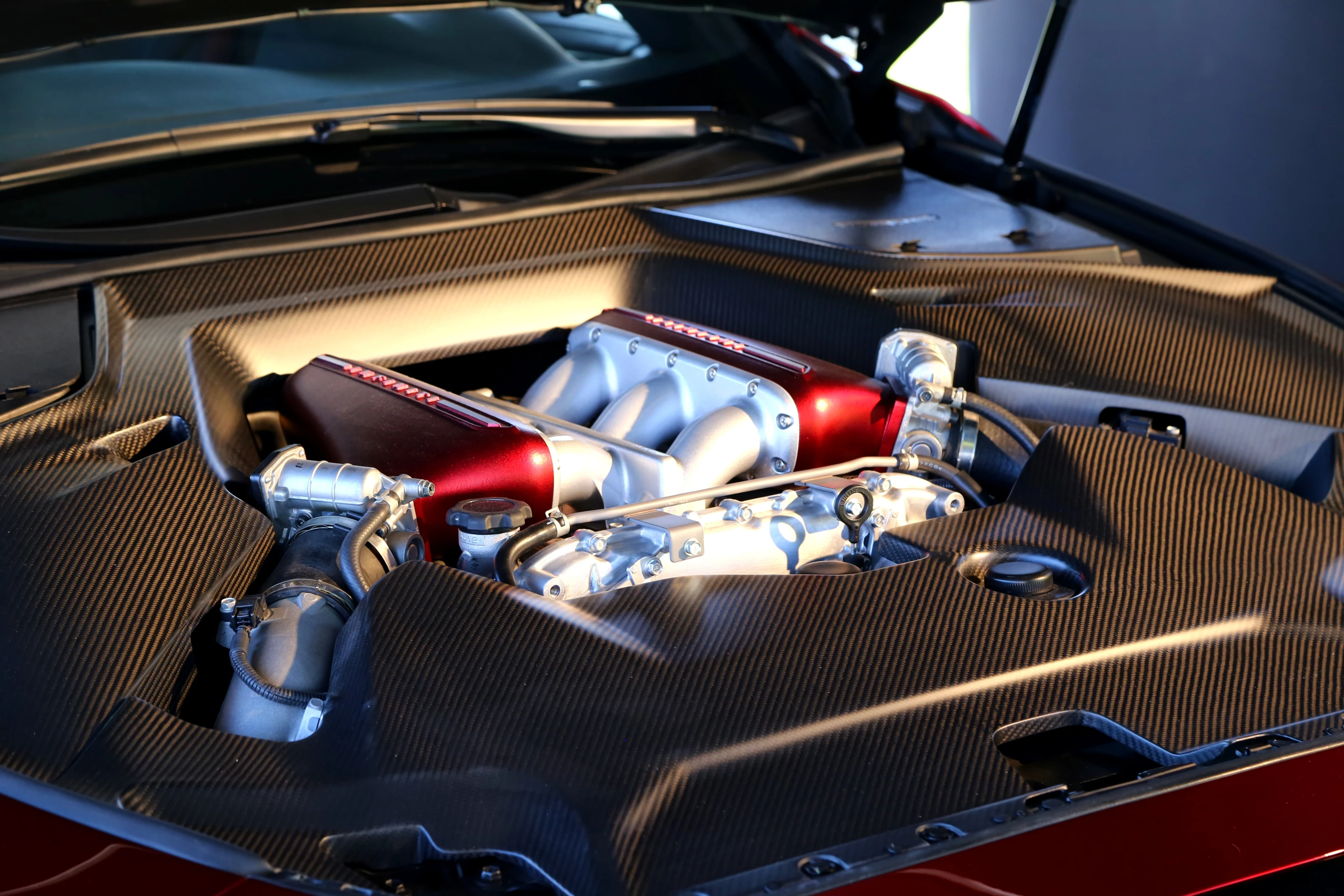 The Q50 Eau Rouge borrows the GTR's twin-turbo 3.8-liter V6 engine, capable of producing 560 hp