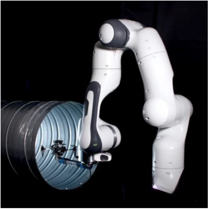 The robot arm used to map airflow in the duct