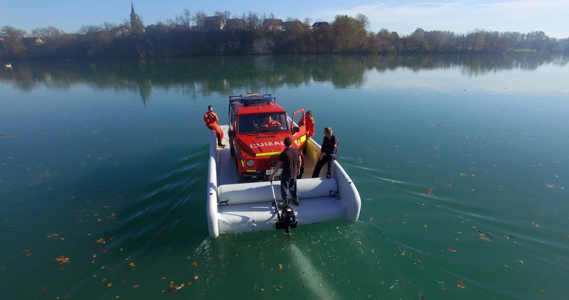The Hovercraft Ferryboat transporting a car across a lake