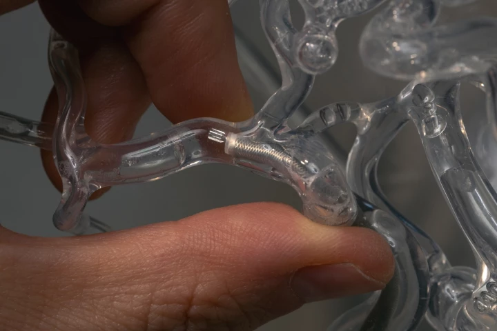 The milli-spinner device, pictured here in a blood vessel model
