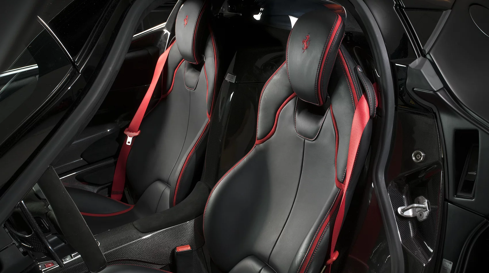 These seats are full leather, as opposed to the Alcantara ones in the other LaFerrari up for sale
