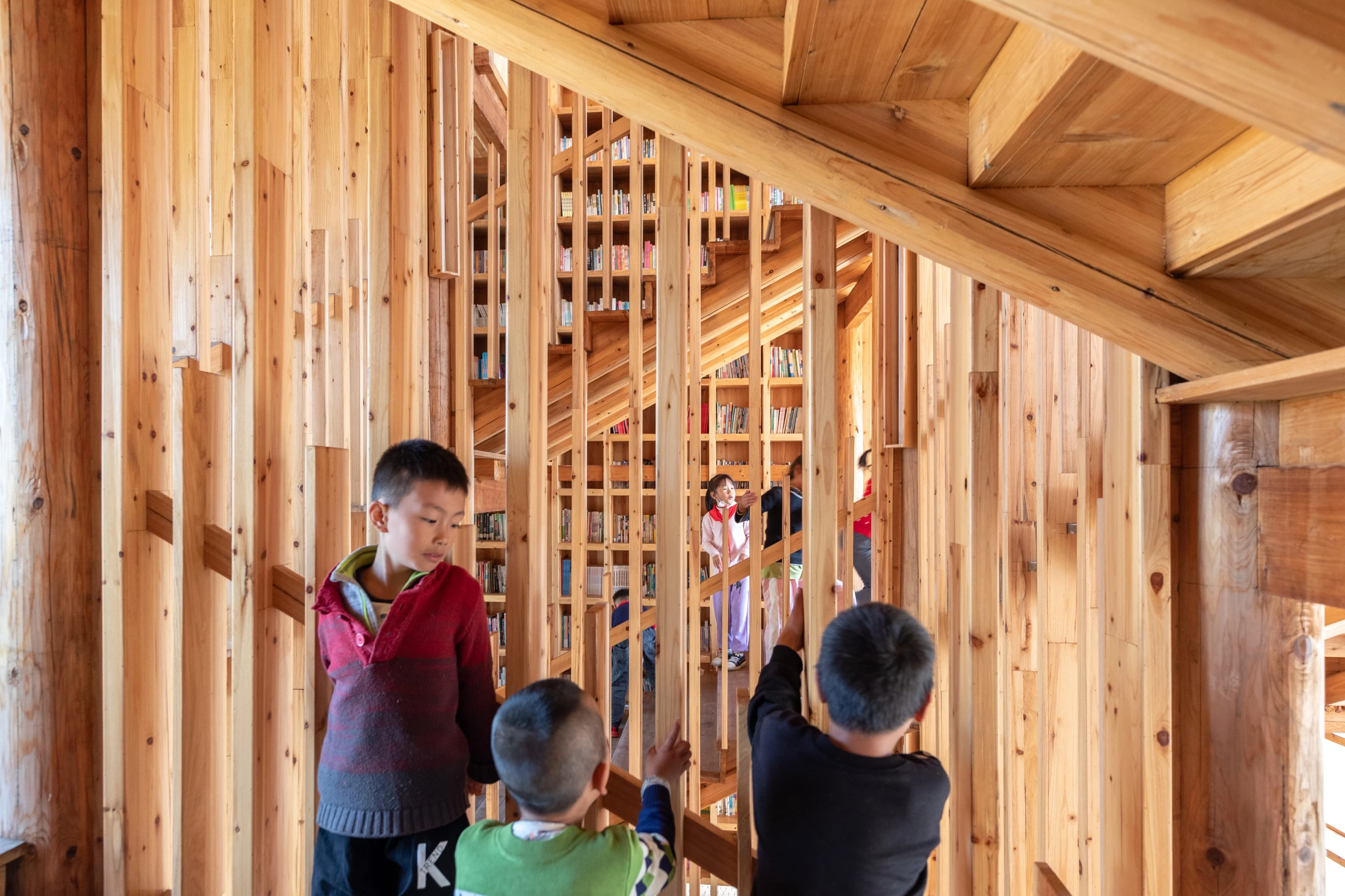 Low-cost timber library wins World Interior of the Year