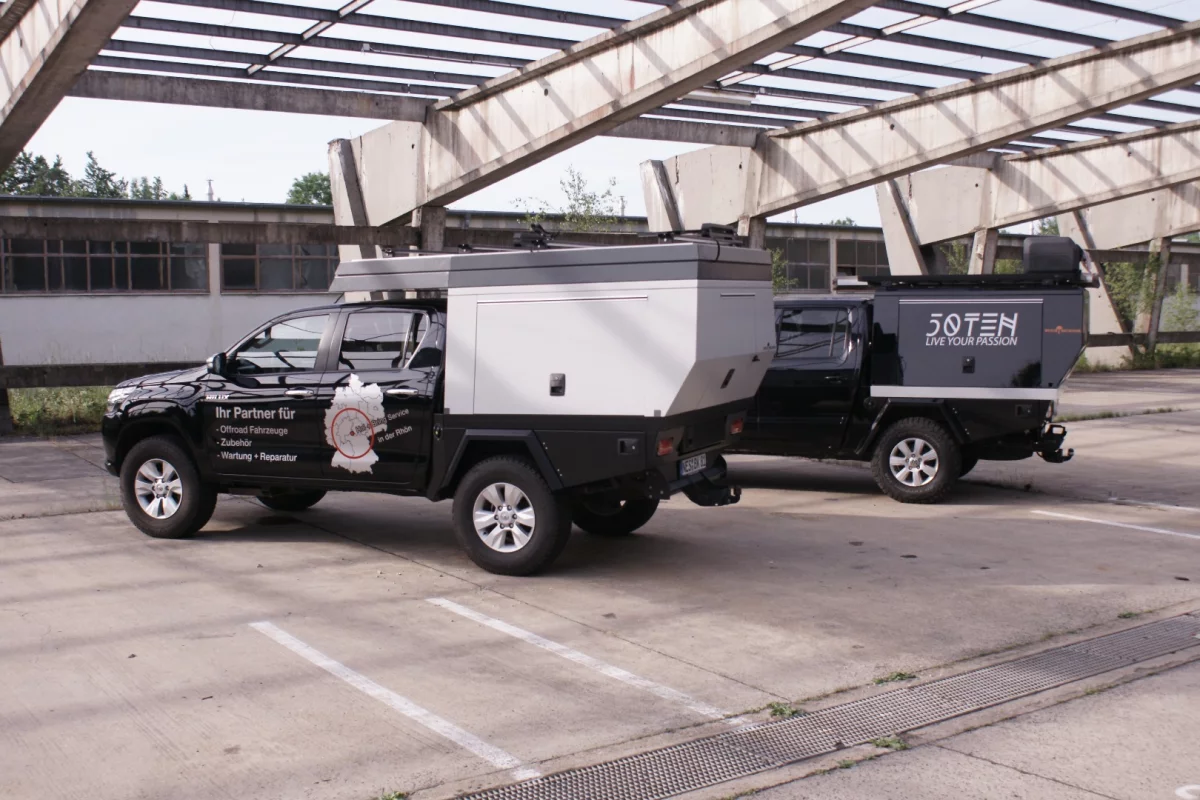Fiftyten with roof tent on the left and with flat-top box on the right