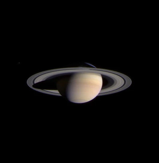 The narrow-angle camera on board the Cassini-Huygens spacecraft took a series of exposures of Saturn and its rings and moons on 9 February 2004, which were composited to create this stunning, colour image. At the time, Cassini was 69.4 million kilometres