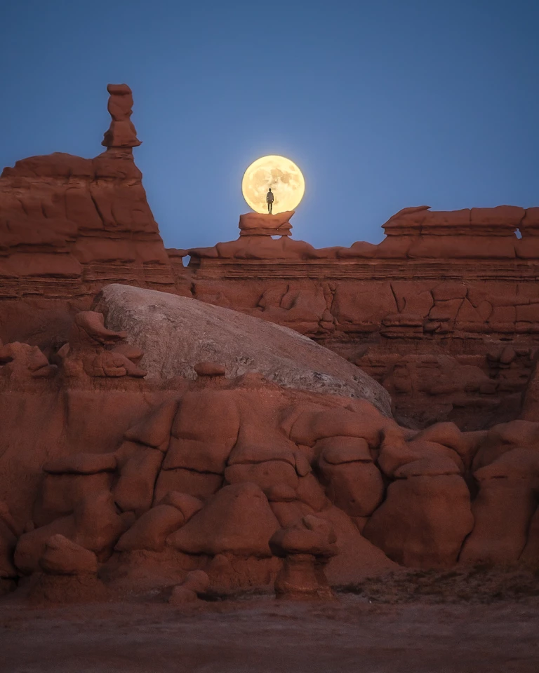 WINNER 'Surprised by a full moon at goblin valley'. Goblin Valley State Park, Emery, USA
