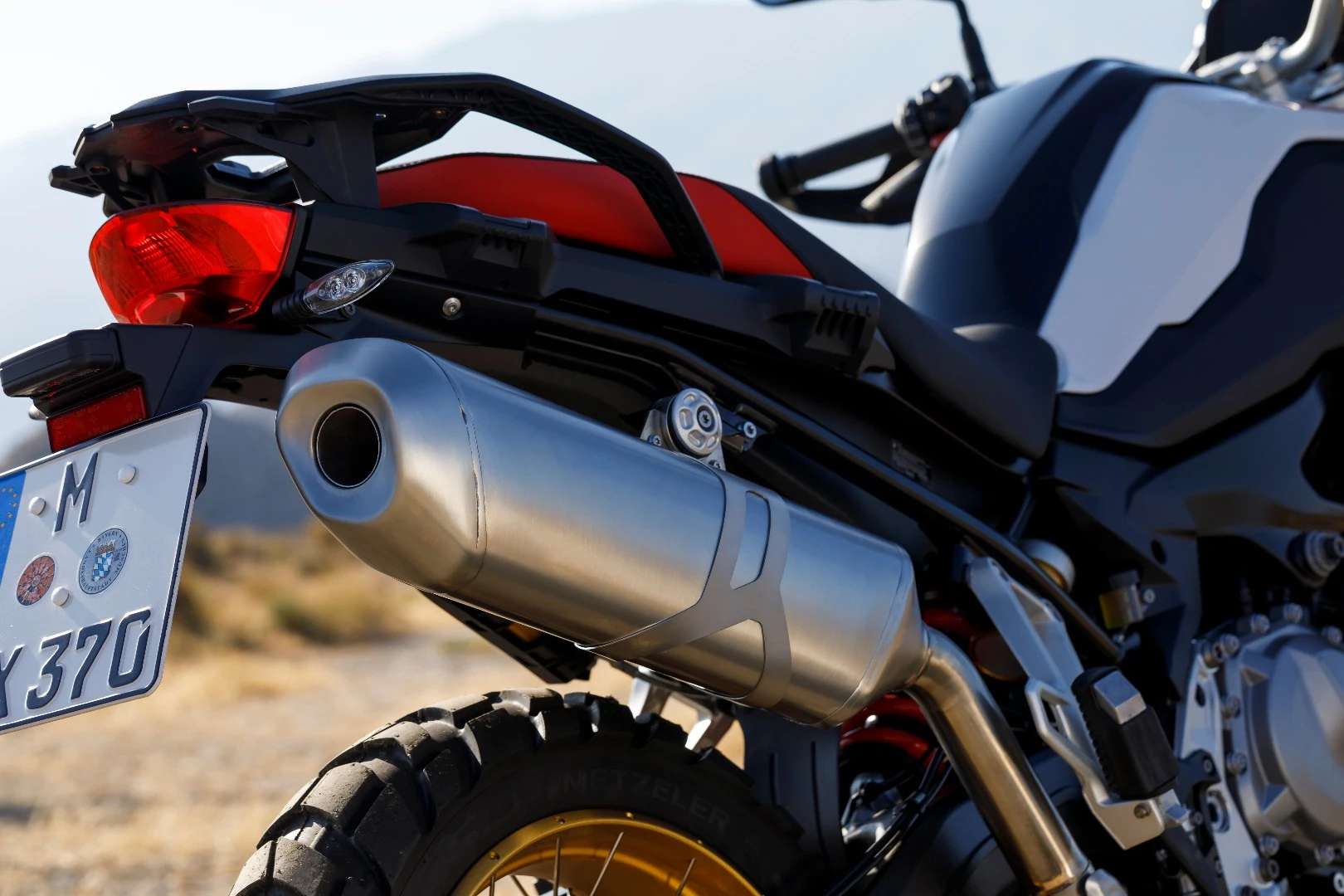 To reduce burns to the rider when pushing the bike BMW has moved the exhaust to the right hand side