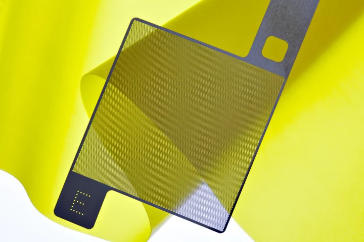 An illustration depicting one of the lattice-like electrodes, over top of one of the elastomer sheets