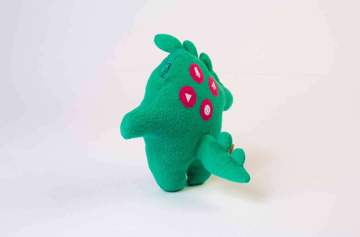 The back side of the dinosaur version of the Toymail Talkie