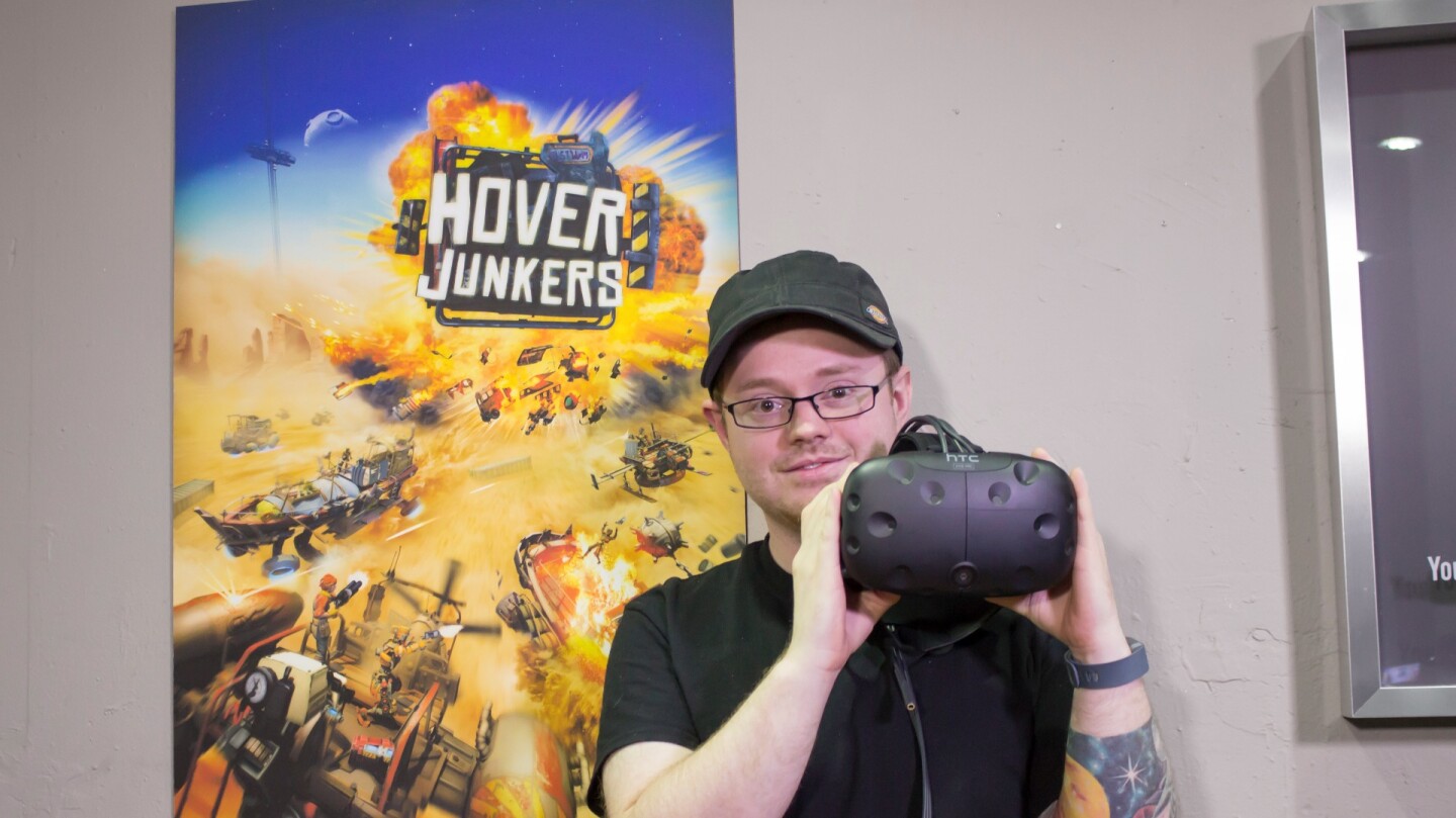StressLevelZero co-founder Alex Knoll, showing off the Vive headset his game will play on
