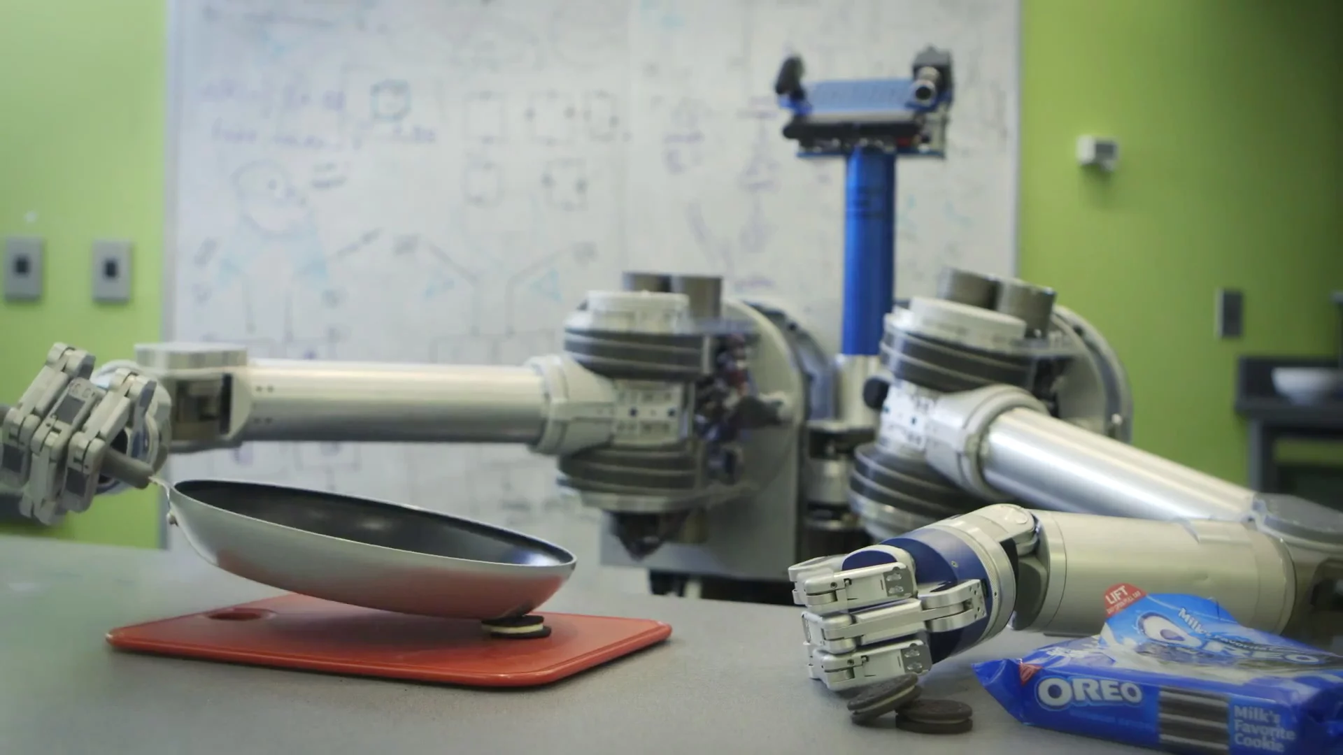 HERB tries unsuccessfully to separate the cookie from the creme with a skillet