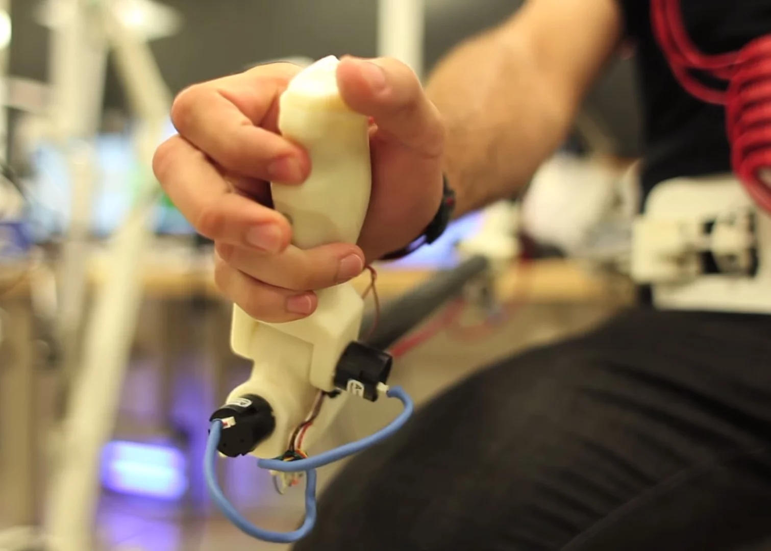 Two joysticks control Hermes' three-fingered hands