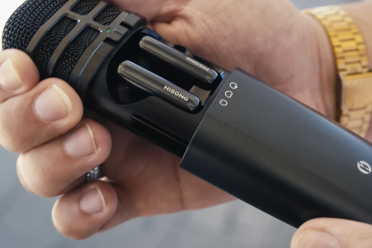 Compact wireless microphone that doubles as a charging bay for the system's wireless in-ear monitors