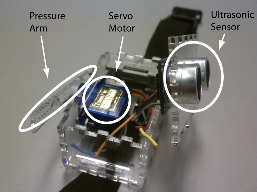 Each module contains an ultrasonic distance sensor that detects objects up to about 17 feet (approx. 5 meters) and a rotary servomotor connected to a pressure arm