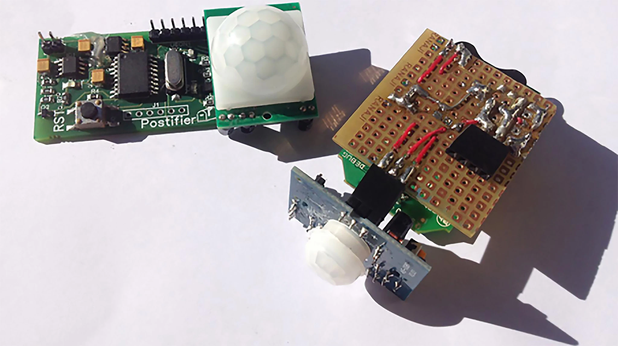 The Postifier attaches to the inner roof of your mailbox, via adhesive