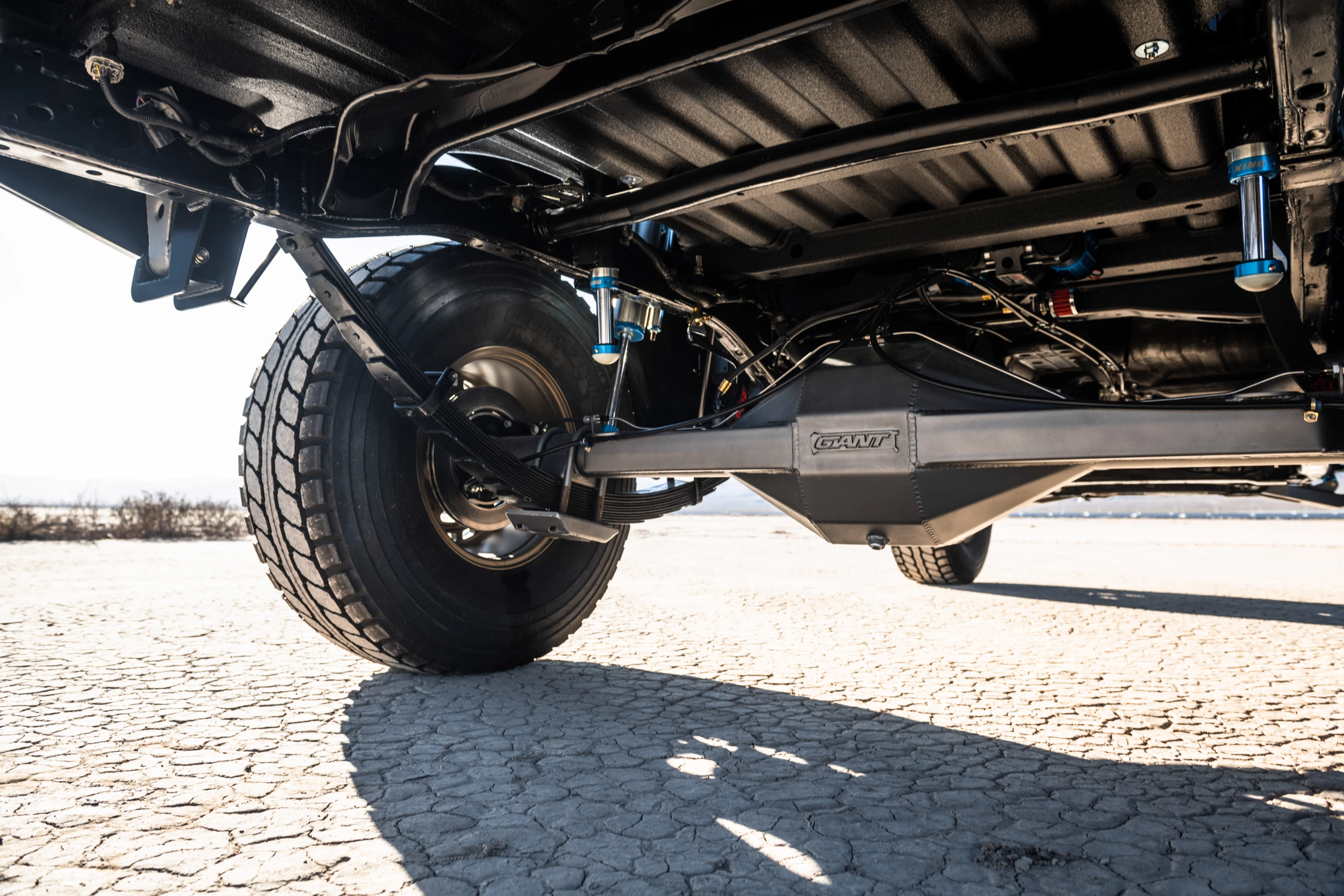 The Giant Motorsports Link Killer rear leaf springs also matched to King Racing shocks on the Frontier Desert Runner shown at SEMA