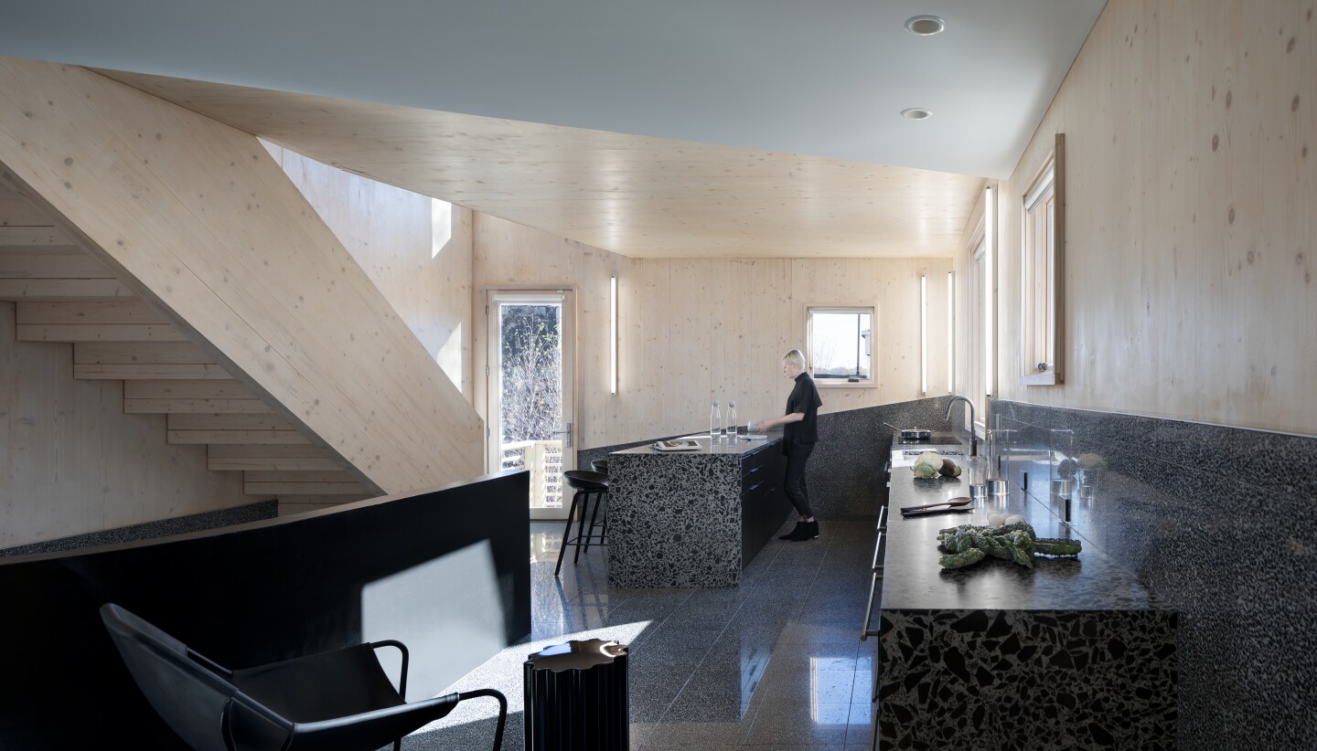 Haus Gables features a stunning black marble modern kitchen