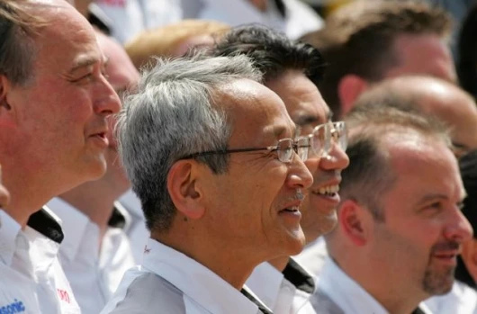 Happy faces in the Toyota pit: John Howett, Tomita Tsutomu, Yoshiaki Kinoshita, Mike Gascoyne