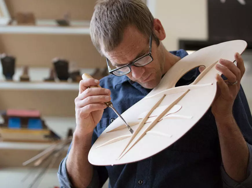 Taylor's Andy Powers says that "by modifying the bracing architecture to change the way the guitar vibrates, we can make the guitar respond more readily to what a musician brings to the strings"