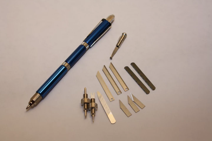 The 13 Function in 1 Pen, with its assortment of tools