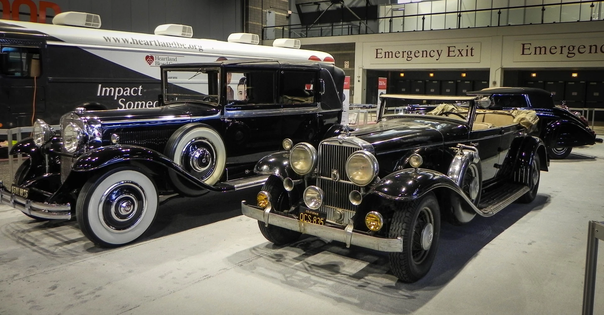 Strangely shoved in the back of the Chicago Auto Show, near the tour buses, were these beautiful classic touring cars