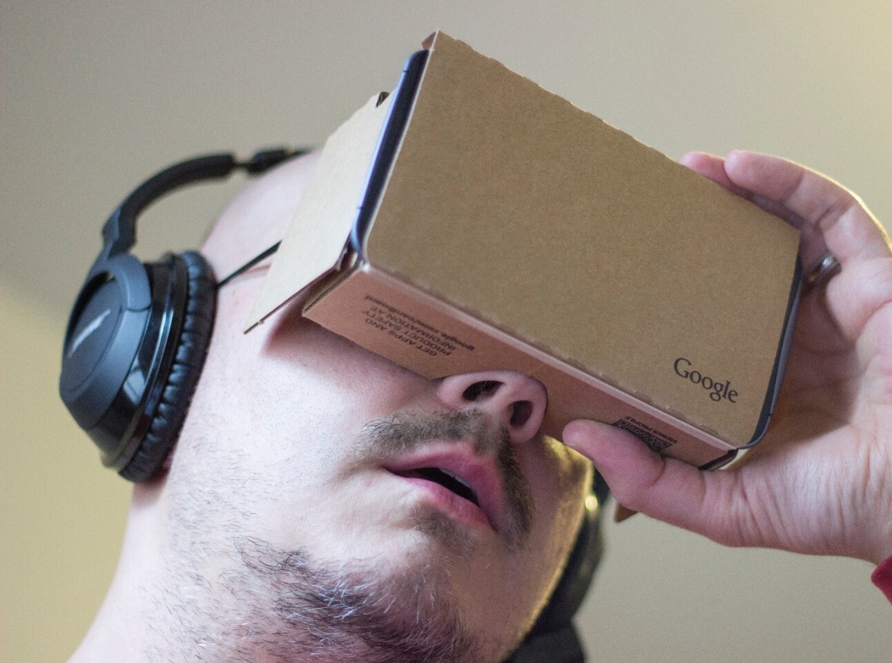 "Wearing" the 2nd-gen Cardboard dev kit (most third-party versions will include bands)