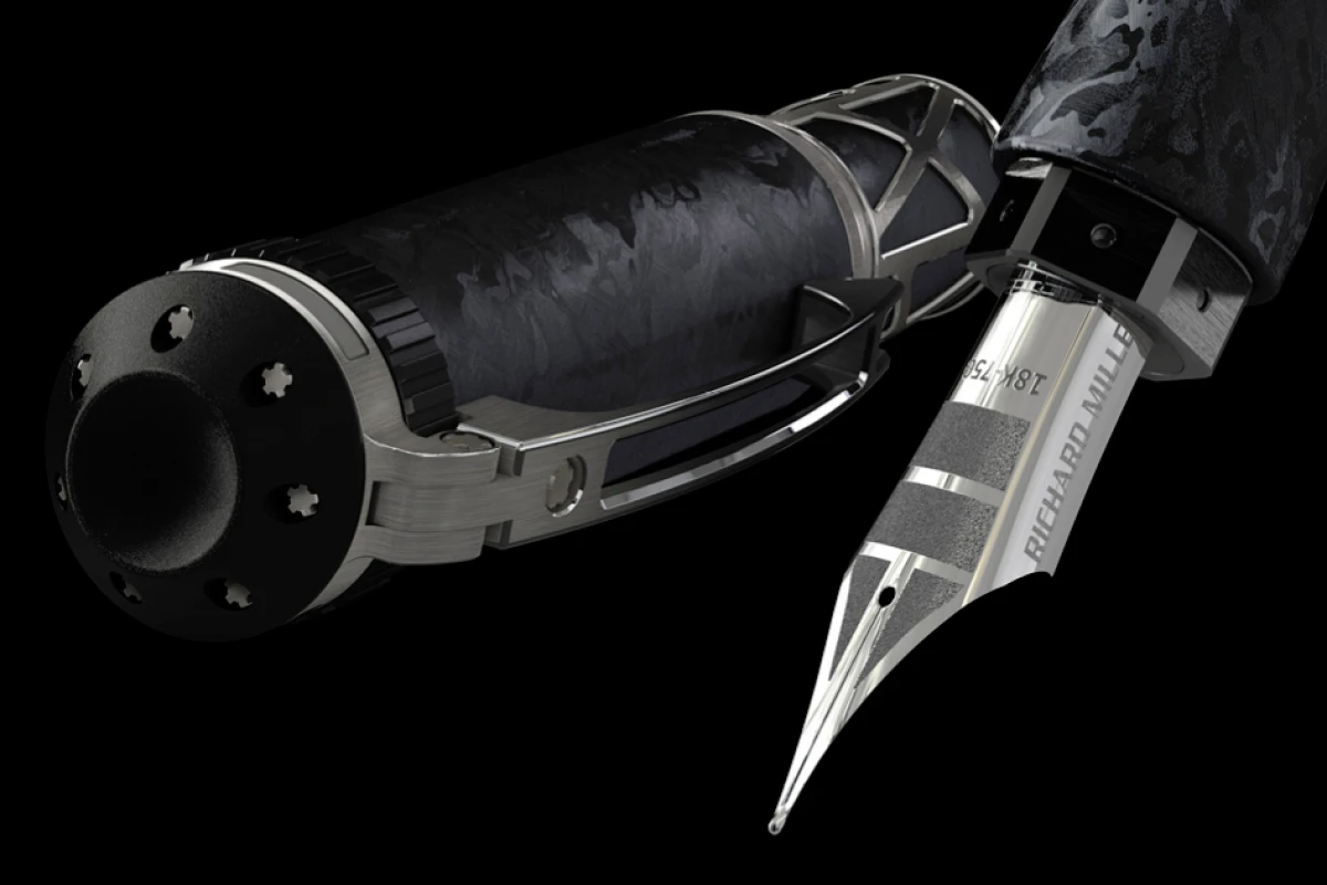 The Richard Mille RMS05 fountain pen uses a precision watch mechanism to extend the white-gold nib