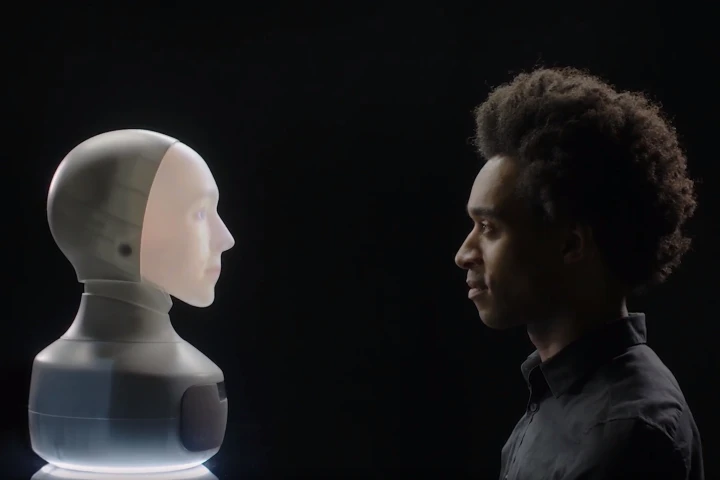 The Furhat system uses back-projection to display a human face onto a mask