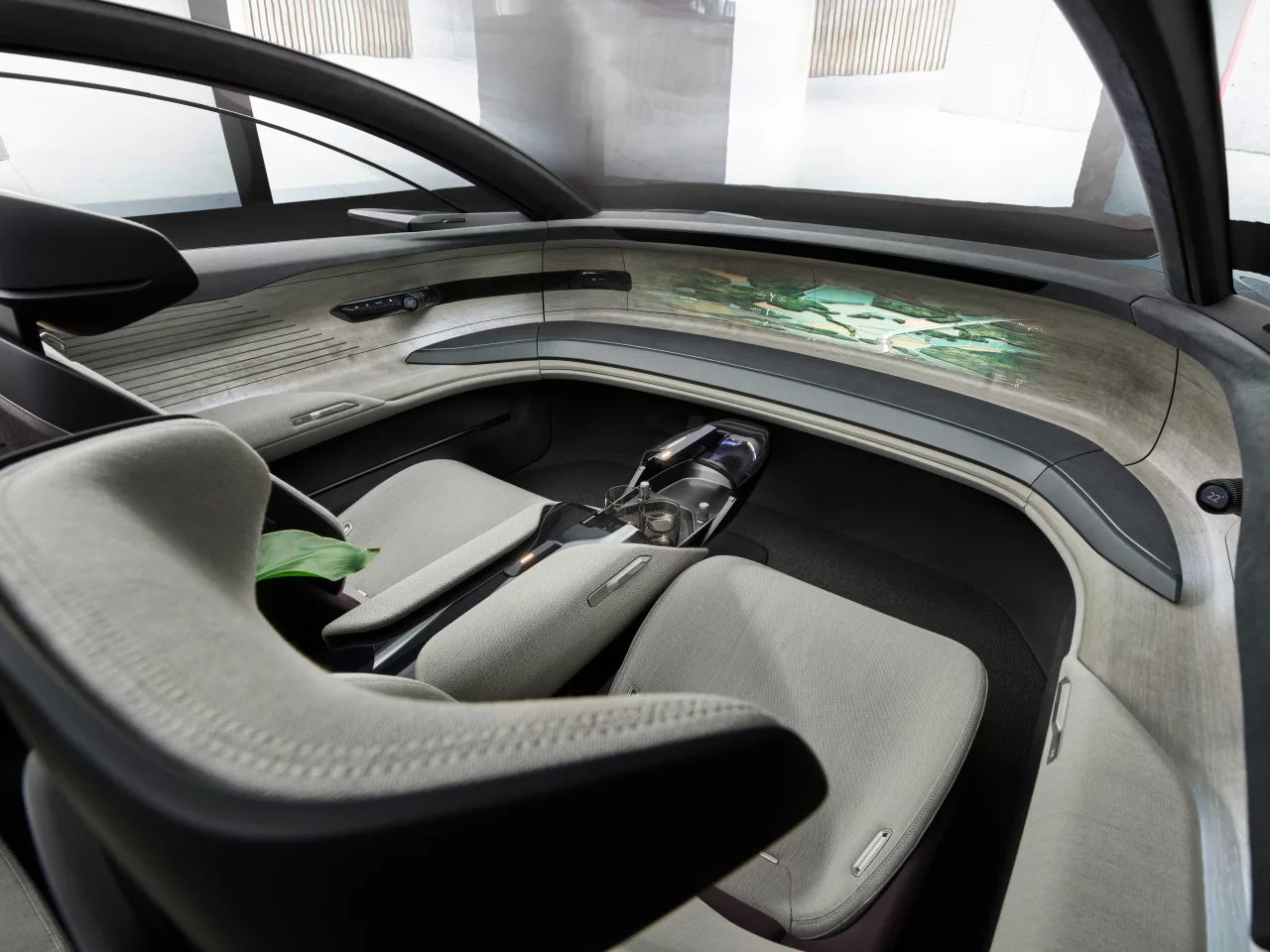 The projector system can show individual displays for driver and front passenger or one large picture