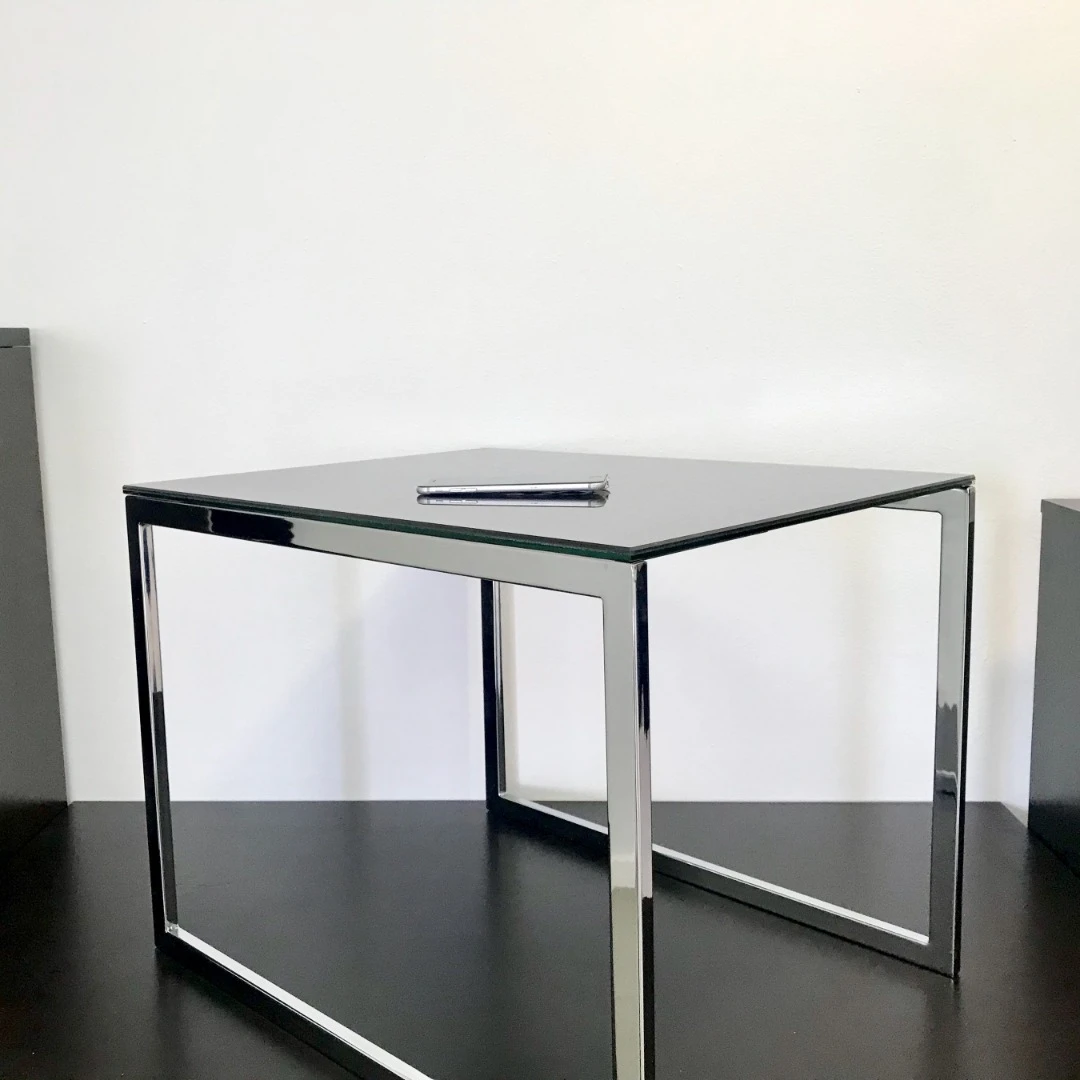 The Ebörd is a table with a surface that can harvest sunlight and wirelessly charge devices