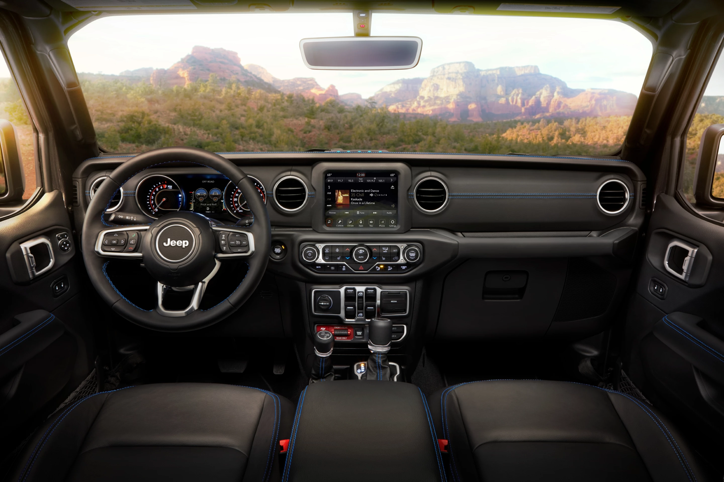 The interior of the 2021 Jeep Wrangler Rubicon 4xe has few changes, but adds some plug-in specific instrumentation for the infotainment and driver information screens