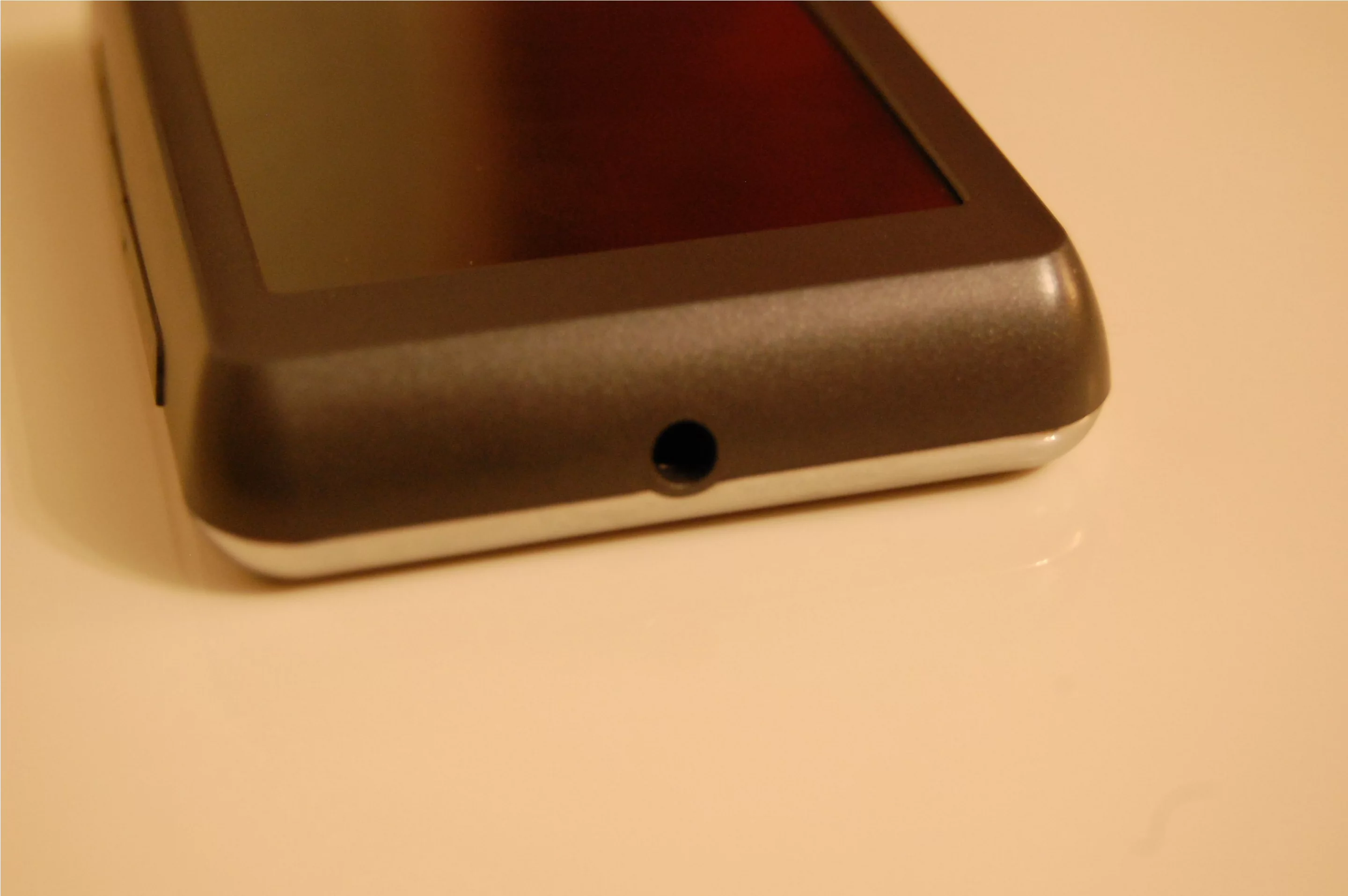 On the left is a 3.5mm audio out jack, and the bottom edge is free of any buttons, ports or other distractions