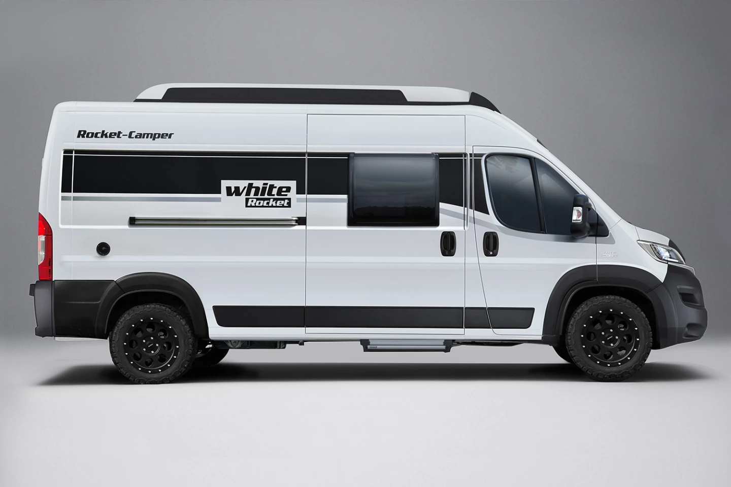 The White Rocket includes the Rocket Roof and the Rocket Mountain Package with suspension lift and upgraded wheels/all-terrain tires