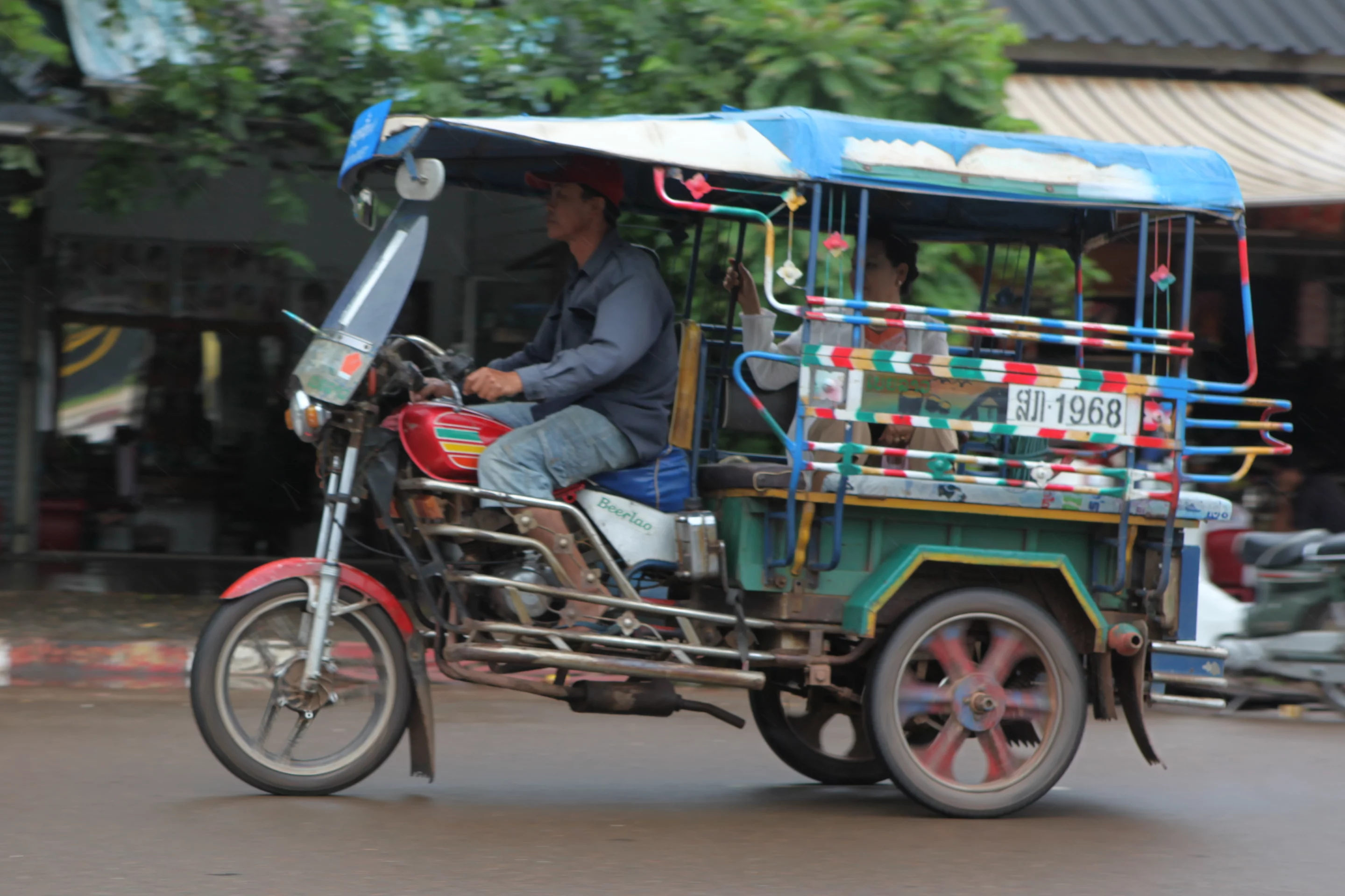 Tuktuks in Laos come from a different branch of the family tree to those of other parts of Asia - they're all cut-and-shut-tf-up jobs and they all have a castor and rake of zero. I tried to find out why they all look so unnatural but ... failed.
