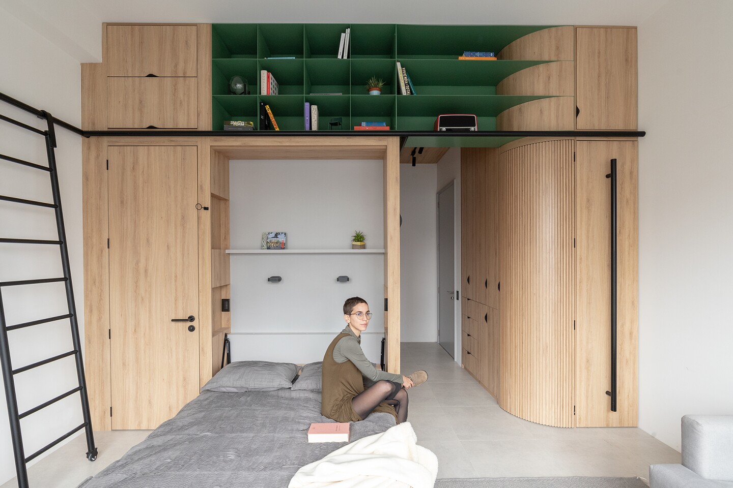 A fold-down bed converts the space into a double bedroom