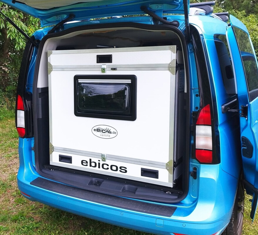 Slide-out camper-in-a-van box turns van into sleeper RV and back again