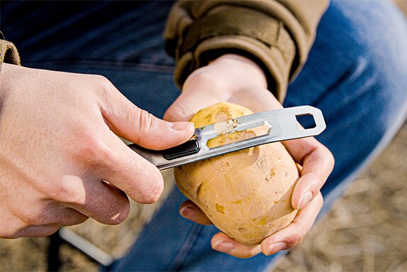 The knife also serves as a peeler