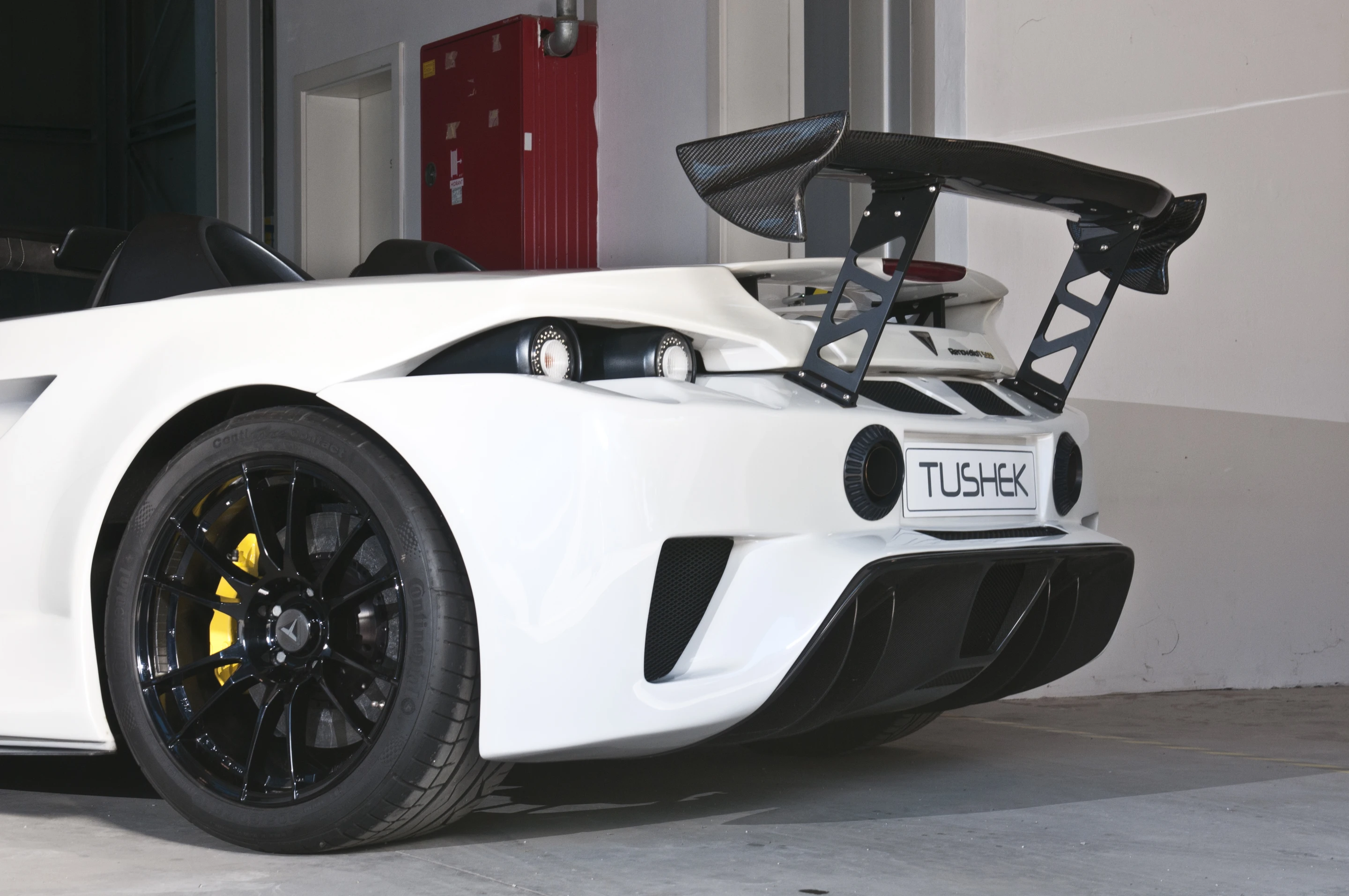 A big wing and rear diffuser add aerodynamics