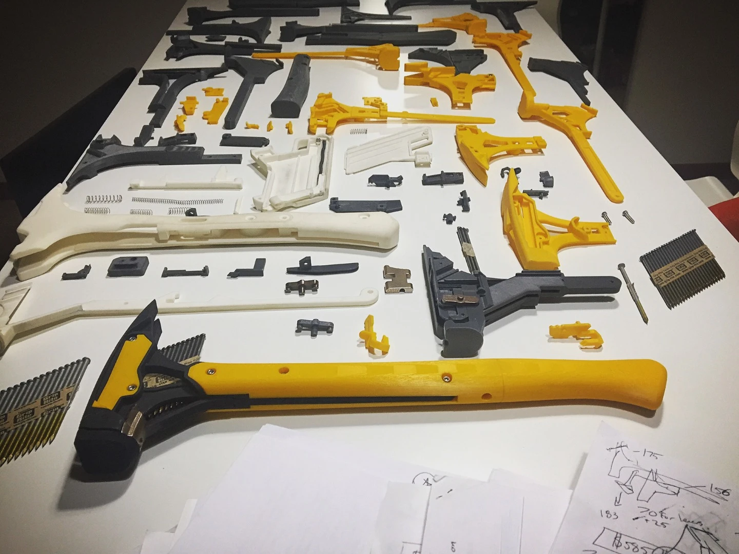 The prototype of Michael Young's single-handed hammer is made from 3D-printed plastic parts